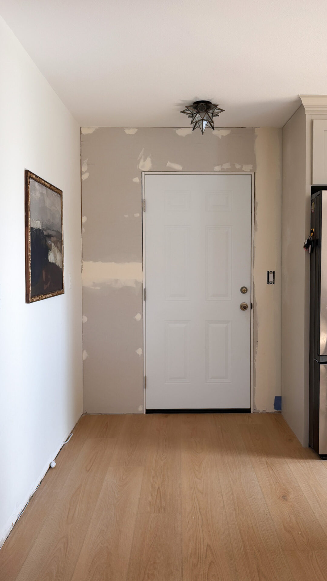 Replacing the walk-in pantry with DIY Pantry Cabinets_garage door
