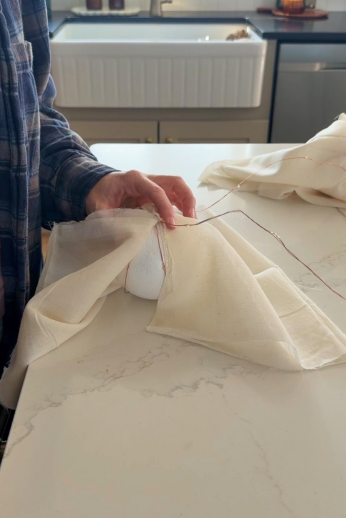 DIY Glowing Ghost Garland_cheesecloth